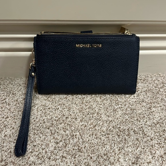 Navy Michael Kors wristlet with double zippers, cc holders and snaps close - Picture 1 of 3